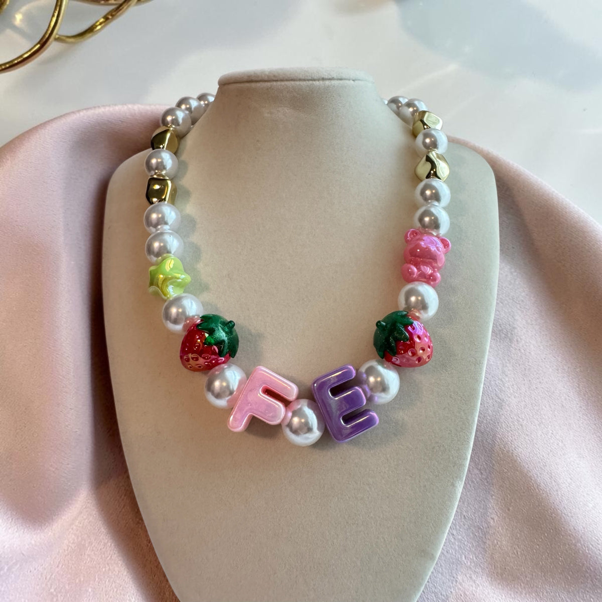 The FE Necklace
